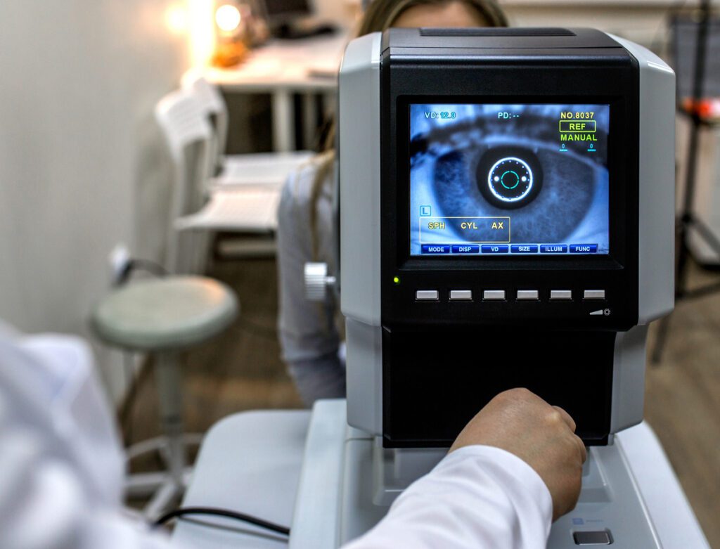 optometrist evaluating patient for a prescription reading